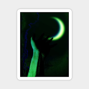 Digital collage and special processing. Hand pointing to the moon. Very beautiful. Green. Magnet