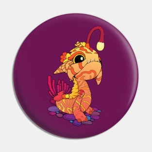 Toothy Orange Baby Sea Monster Pin