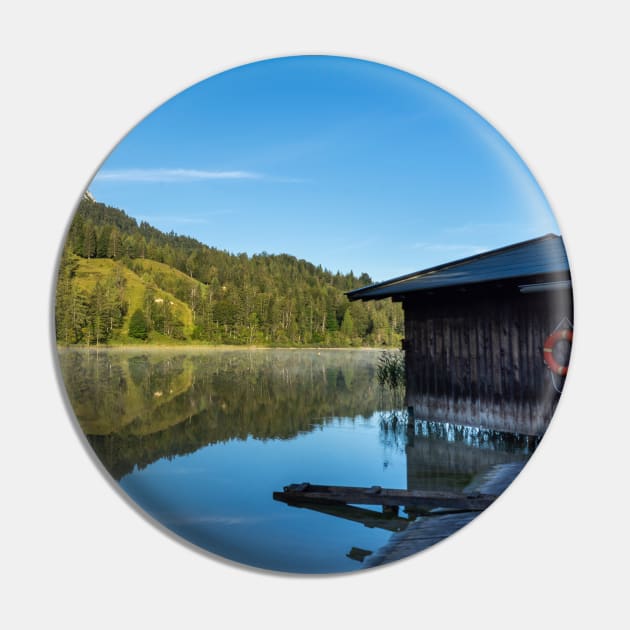 Lake water reflections with wooden boathouse wide angle. Amazing shot of a wooden house in the Ferchensee lake in Bavaria, Germany, in front of a mountain belonging to the Alps. Pin by EviRadauscher