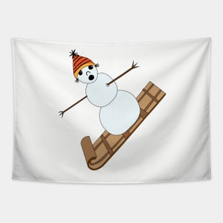 Snowman sledding on toboggan Tapestry