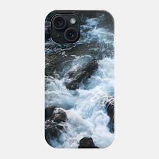 A breaking surge of sea water over rocks, Isle of Skye, Scotland Phone Case