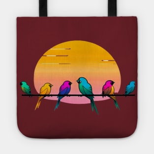 A design featuring a group of colorful birds perched on a wire, with a sunset or sunrise in the background. Tote