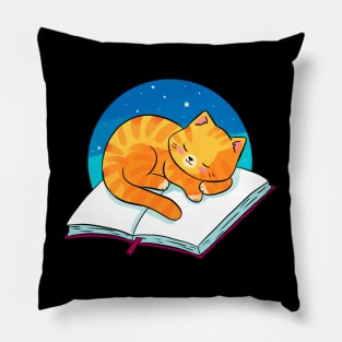 Cute ginger cat sleeping on a book Pillow