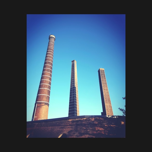 Old brickworks chimneys on Sydney Park, Australia. by brians101