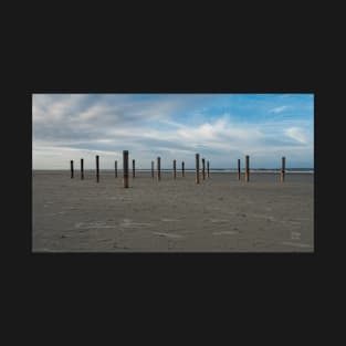 Wooden poles on the beach of Schiermonnikoog, Netherlands T-Shirt