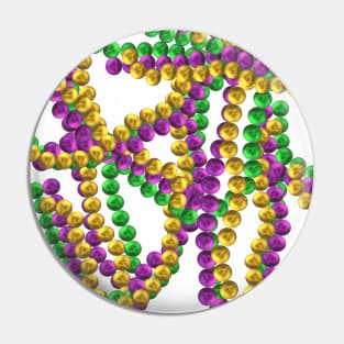 Twisted Mardi Gras bead necklaces in purple, green and gold representing justice, faith and power.  White background. Pin