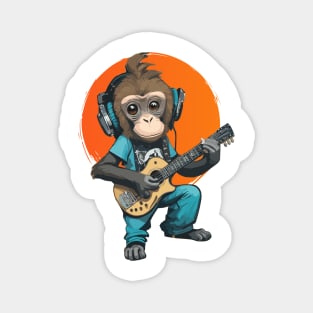 Monkey with headphone plays the guitar Magnet