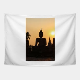 Buddha statue against sunset silhouette Tapestry