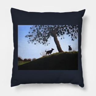 cone tree on hillside with dogs playing Pillow