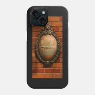 Haunted Mansion Board In The Brick Wall Phone Case