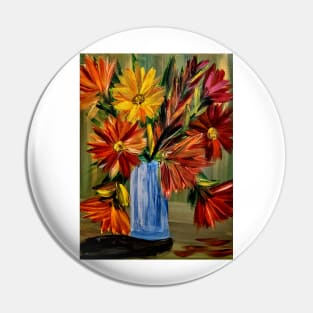 A lovely boutique of abstract vibrant bright colorful  flowers in a tall glass vase Pin