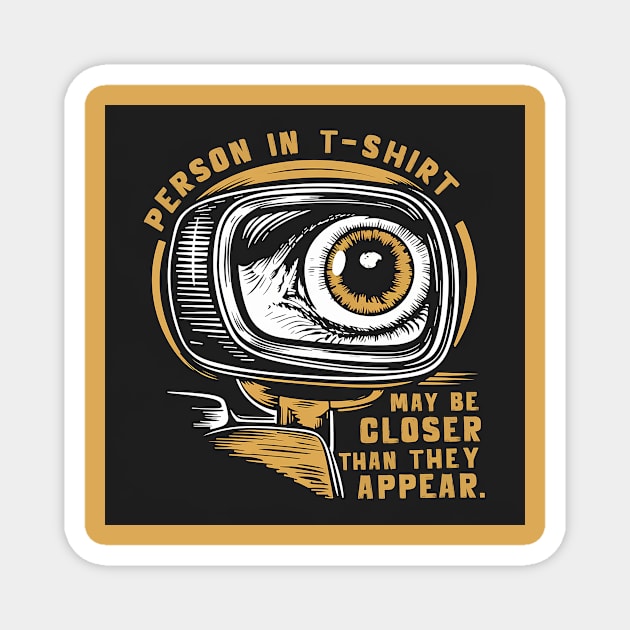 Person in the t-shirt may be closer than they appear Magnet by Dizgraceland