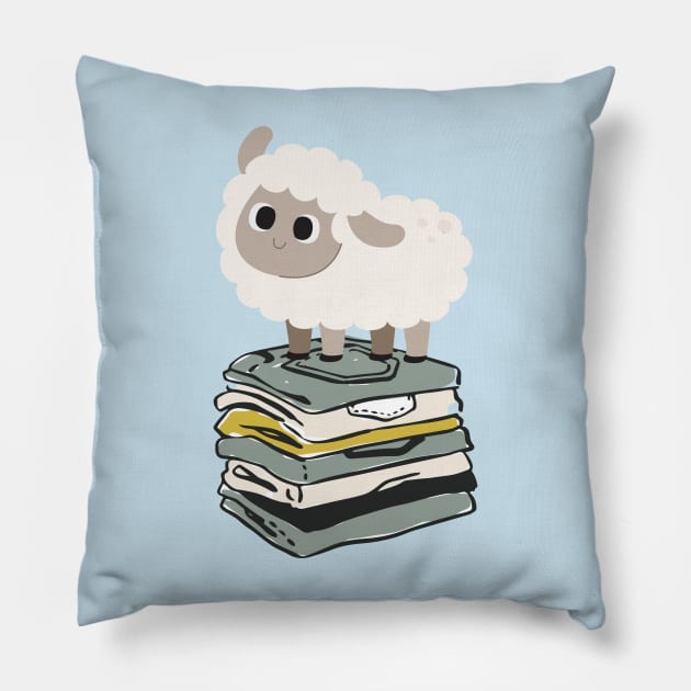 Cute Baby Sheep on top of folded clothes Pillow by Shirtmeca