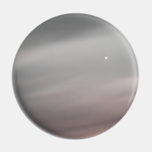 Moonrise over a cloudy sky Pin