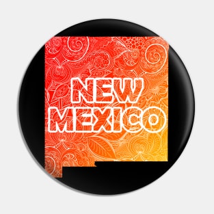 Colorful mandala art map of New Mexico with text in red and orange Pin