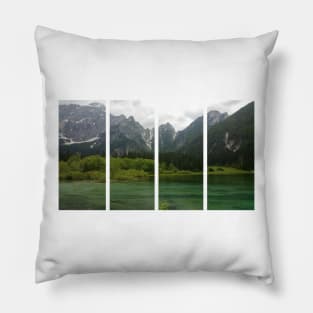 A static shot from the shore of Fusine lake in the Julian Alps with snowy mountains in background. Beautiful nature in a spring cloudy day; no people around Pillow