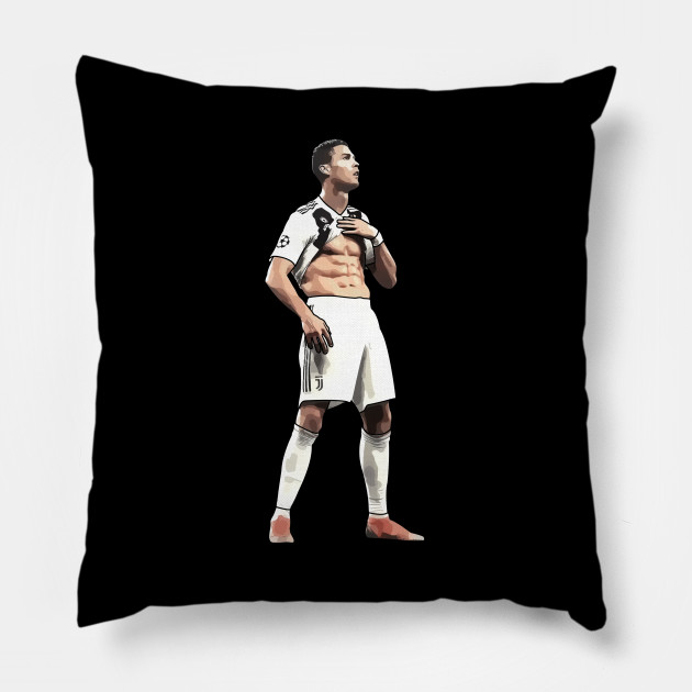 Cristiano Ronaldo showcases his washboard abs while lying on a trio of  Christian Dior cushions