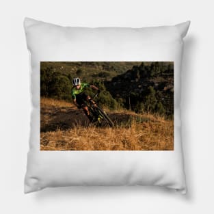 Mountain Biker riding a single track at sunset Pillow