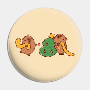 Capybara decorating Christmas tree Pin