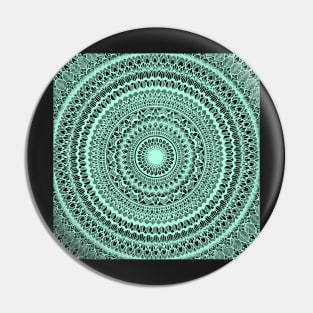 Light green mandala design on black Pin