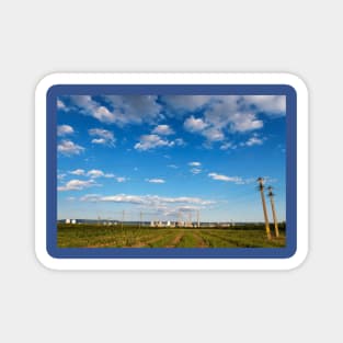 Blue cloudy sky over factory, industrial zone, Romania Magnet