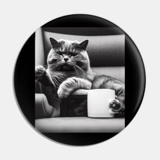 Cat enjoys coffee on the couch Pin