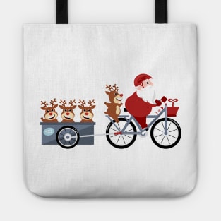 Santa Claus  riding a bike with reindeer in a trailer Tote