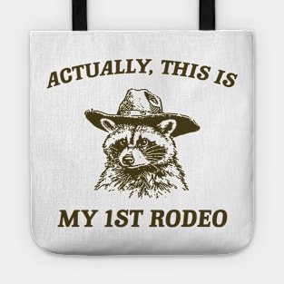 Raccoon Actually This Is My First Rodeo Shirt, Funny Trash Panda Meme Tote