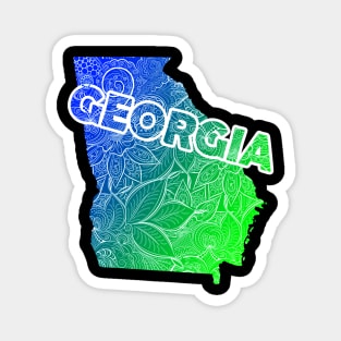 Colorful mandala art map of Georgia with text in blue and green Magnet