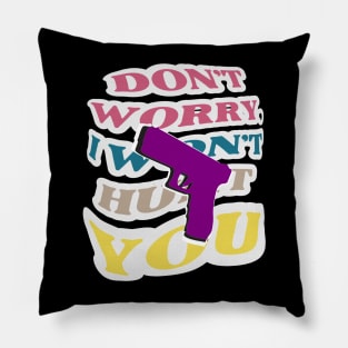 Don't worry, I won't hurt you. A purple gun on the background of a colorful inscription Pillow