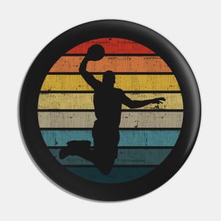 Basketball Player Silhouette On A Distressed Retro Sunset product Pin