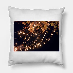 Lights draping off the Tree with a Black Sky in the background Pillow