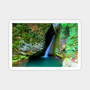 Scene from Sibillini Mountains with Cascata del Pellegrino waterfall, basin, rocks Magnet