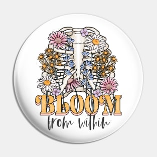 Bloom from within floral rib cage design Pin