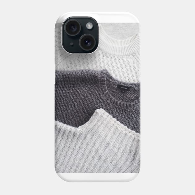 Close up photo of three sweatshirts Phone Case by mydesignontrack