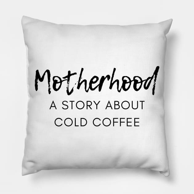 Motherhood. A Story About Cold Coffee. Funny Mom Coffee Lover Saying. Black Pillow by That Cheeky Tee