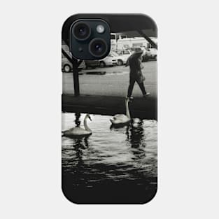 People shelter from the rain in Wroxham, Norfolk, UK Phone Case