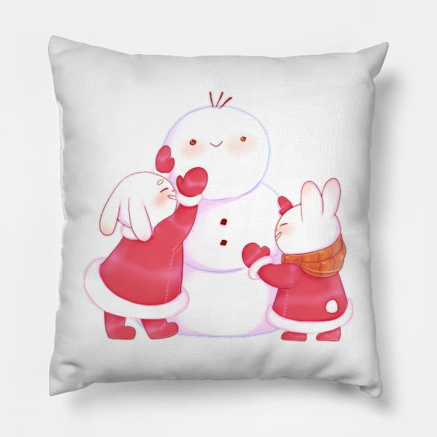 Cute bunnies building snowman Pillow by Itsacuteart