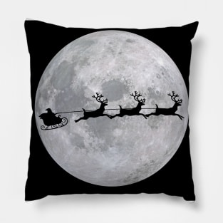 Santa and his sleigh flying across the moon at Christmas time! Pillow