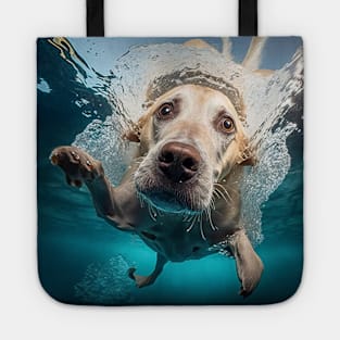 Dog diving in a swimming pool Tote