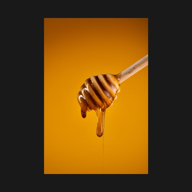 Honey dripping on wooden dipper by naturalis