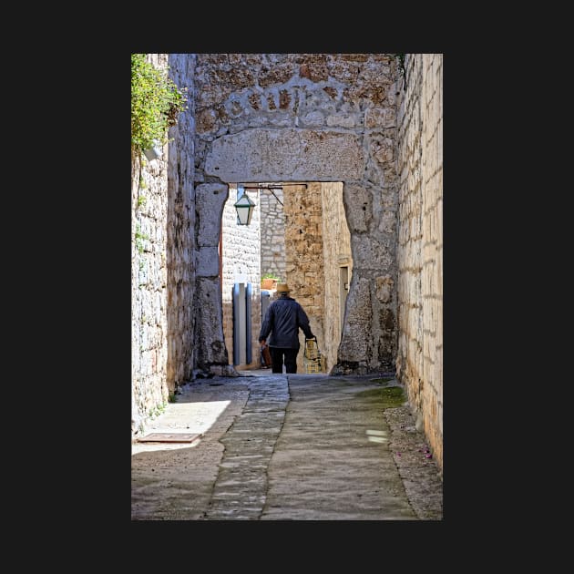 Man Walking Through Archway, Hvar by BrianPShaw