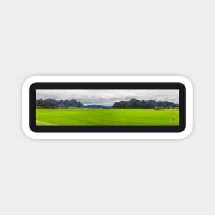 Panorama of green rice fields and Phong Nha city Magnet