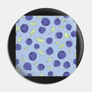 Blueberries and leaves on blue background Pin