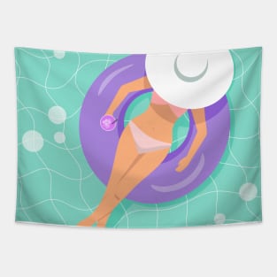 Woman floating on rubber ring with cocktail in her hand Tapestry