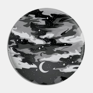 Dark cloudy sky above mountains with a crescent moon Pin