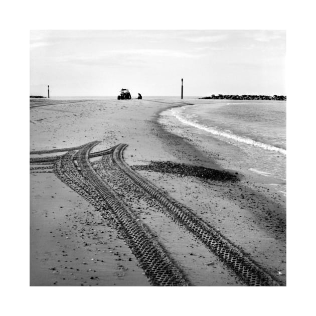 Tractor tracks in the sand on the beach at Sea Palling, Norfolk, UK by richflintphoto