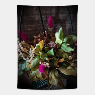 Picturesque colorful bouquet of flowers in decorative green basket Tapestry