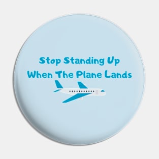 Hilarious Airplane Humor Shirt - "Stop Standing Up When The Plane Lands" Tee, Perfect Gift for Frequent Flyers & Travel Enthusiasts Pin