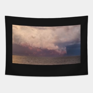 Colorful stormy sky over the ocean Tapestry